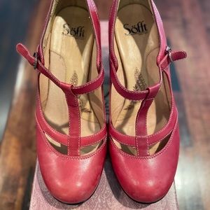 Red leather Mary Janes.
